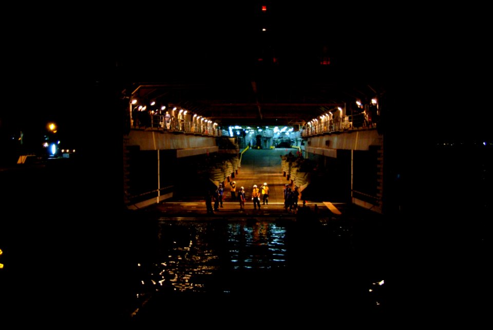 US Navy 060217-N-4772B-258 The amphibious dock landing ship USS Harpers Ferry (LSD 49) prepares to take on equipment from Landing Craft Utility One Six Two Seven (LCU-1627) through a stern gate marriage