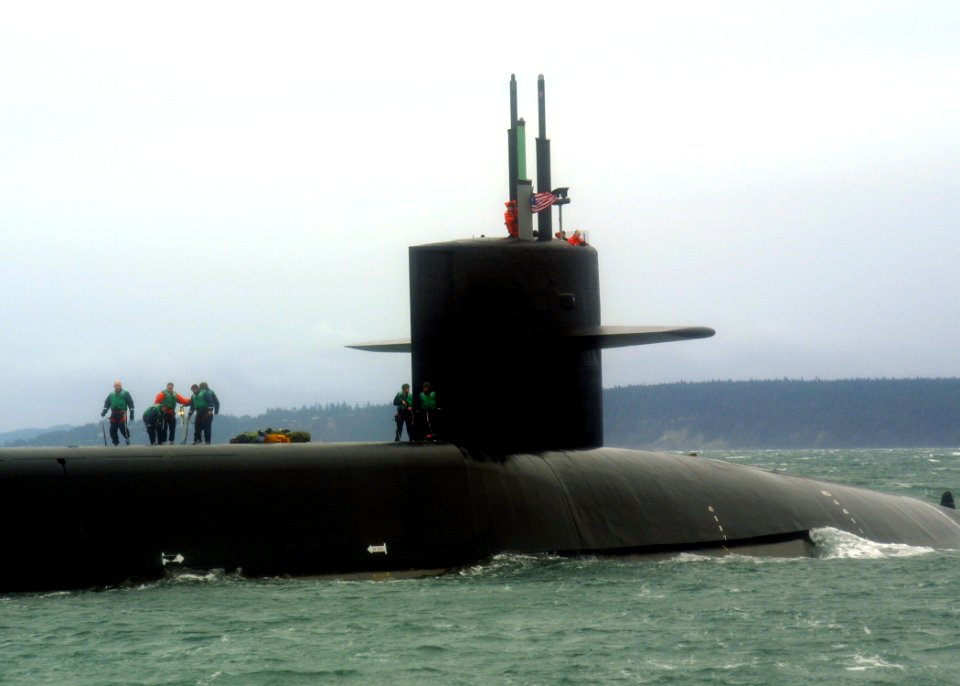 US Navy 060129-N-1464F-004 The guided missile submarine USS Ohio (SSGN 726) prepares to stop for a personnel transfer in Puget Sound, Washington
