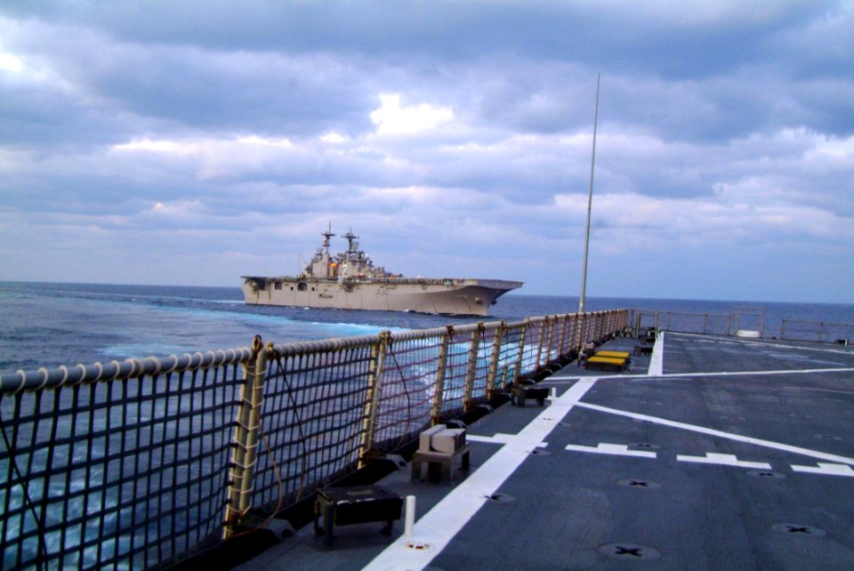 US Navy 060205-N-4772B-200 The amphibious assault ship USS Essex (LHD 2) pulls away from the amphibious dock landing ship USS Harpers Ferry (LSD 49) following a scheduled underway replenishment (UNREP)