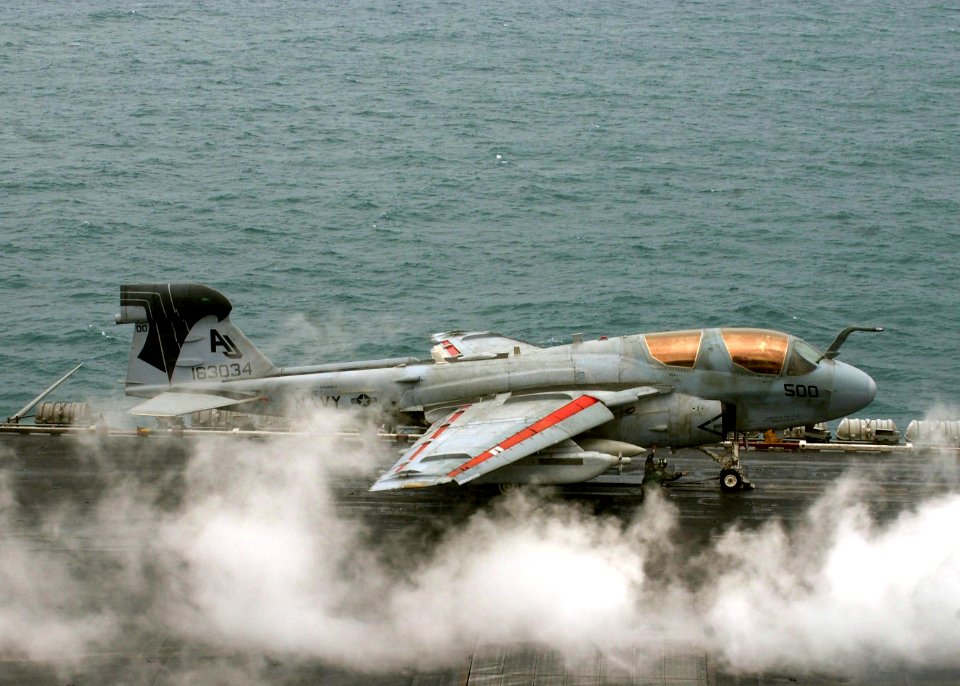US Navy 060204-N-5832A-006 An EA-6B Prowler assigned to the Shadowhawks of Electronic Attack Squadron One Four One (VAQ-141) prepares to launch off the flight deck aboard the Nimitz-class aircraft carrier USS Theodore Roosevelt