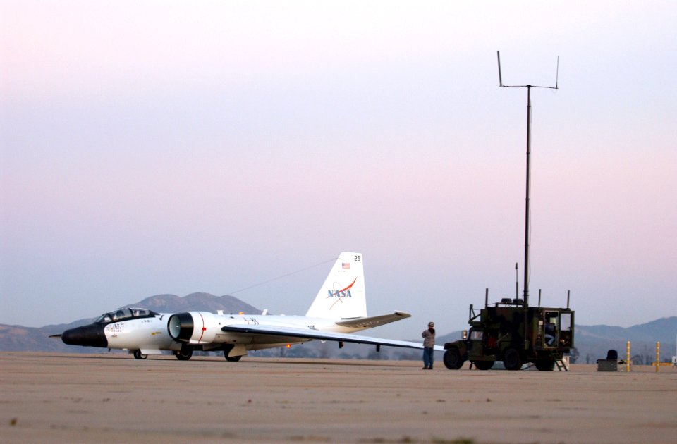 US Navy 060224-F-0017M-005 A NASA WB-57 loaded with a Battlefield Airborne Communications Node (BACN) communicates with the U.S. Joint Forces Command's Rapid Attack Information Dissemination-Execution Relay mobile vehicle