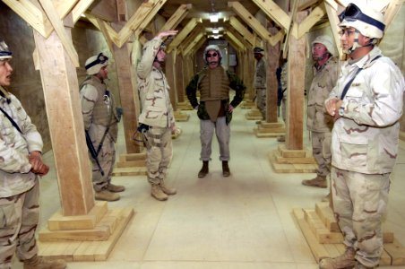 US Navy 060129-N-2568S-068 Secretary of the Navy (SECNAV), the Honorable Dr. Donald C. Winter, tours a dining facility being built by U.S. Navy Seabees for use by the Iraqi Security Force
