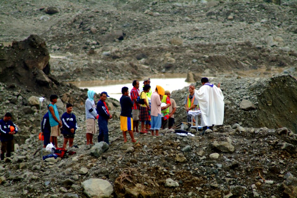 US Navy 060224-N-4772B-140 Religious services are held on the site of a massive Feb. 17 landslide on the island of Leyte