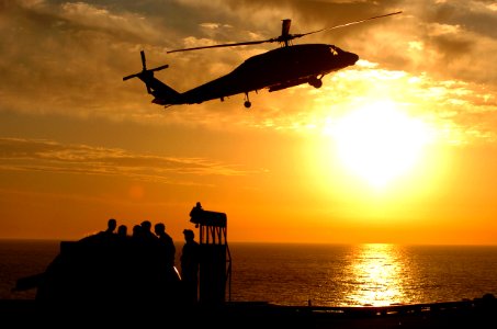 US Navy 060207-N-7232R-137 A SH-60 Seahawk assigned to the Eightballers of Helicopter Antisubmarine Squadron Eight (HS-8) prepare for landing on the flight deck of the Nimitz-class aircraft carrier USS John C. Stennis (CVN 74)