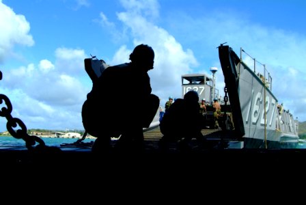 US Navy 060209-N-4772B-379 Sailors assigned to the amphibious dock landing ship USS Harpers Ferry (LSD 49) perform a stern gate marriage with Landing Craft Utility (LCU) 1627