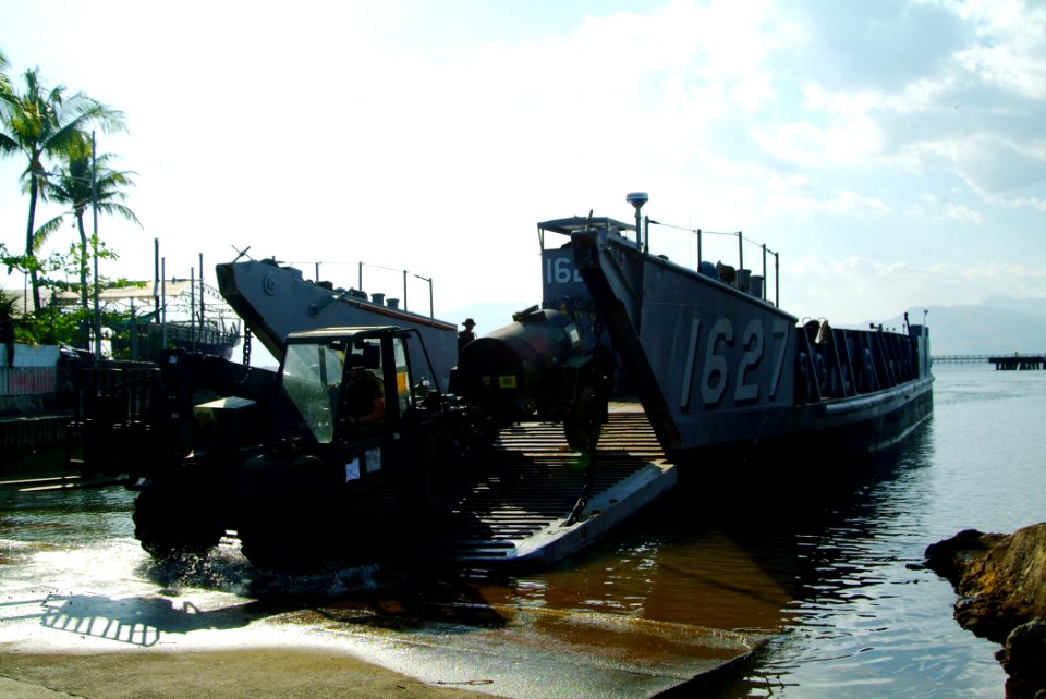 US Navy 060217-N-4772B-152 Members of Beachmaster Unit One (BMU-1) detachment WESTPAC offload equipment from Landing Craft Utility One Six Two Seven (LCU-1627) in the Philippines