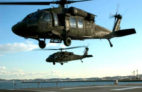 US Navy 060124-N-2385R-010 Assistant to the President and Deputy National Security Advisor, Dr. Jack D. Crouch II, and his delegation depart Commander, Fleet Activities Yokosuka, Japan, via UH-60A Black Hawk helicopters
