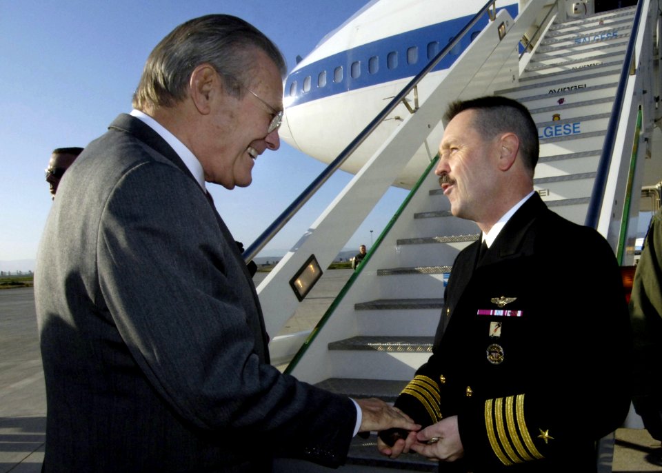 US Navy 060211-N-0696M-408 Secretary of Defense (SECDEF) the Honorable Donald H. Rumsfeld, thanks U.S. Navy Capt. Joseph Stuyvesant for his hospitality before departing to Tunisia from Naval Air Station Sigonella, Sicily