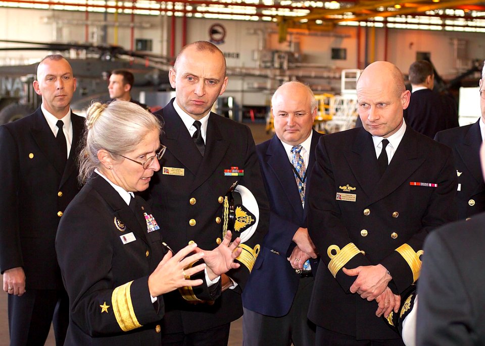 US Navy 060215-N-0000X-001 Commander, Mine Warfare Command Rear Adm. Deborah Loewer, briefs Royal Norwegian Navy guests on board Naval Air Station Corpus Christi