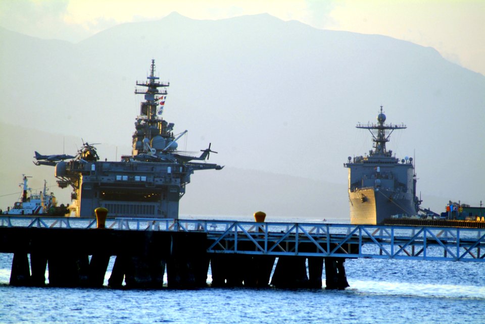 US Navy 060217-N-4772B-192 The dock landing ship USS Harpers Ferry (LSD 49), right, and amphibious assault ship USS Essex (LHD 2) prepare to get underway shortly after arriving in Subic Bay, Philippines