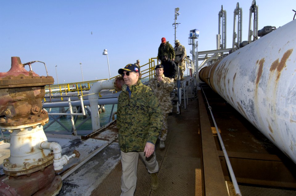 US Navy 060130-N-2568S-032 Secretary of the Navy (SECNAV), the Honorable Dr. Donald C. Winter, tours an oil terminal in the Persian Gulf