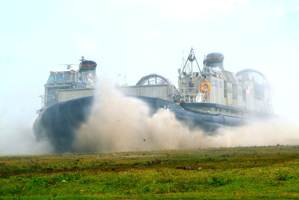 US Navy 060303-N-4772B-150 A Landing Craft, Air Cushion (LCAC) comes ashore to load equipment from the 31st Marine Service Support Group (MSSG) on the island of Jolo