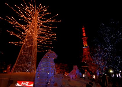 US Navy 060209-N-7526R-205 Illuminated trees and ice sculptures line the streets leading up to Sapporo's TV Tower during the Sapporo Ice Festival