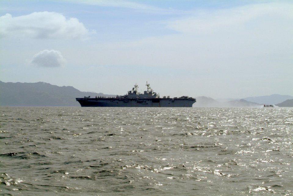 US Navy 060221-N-4772B-185 The amphibious assault ship USS Essex (LHD 2) conducts Landing Craft, Air Cushion (LCAC) operations in the waters off the Philippine coast