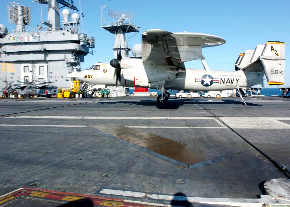 US Navy 060227-N-7359L-002 An E-2C Hawkeye assigned to the Tigertails of Carrier Airborne Early Warning Squadron One Two Five (VAW-125), lands aboard the Nimitz-class aircraft carrier USS Dwight D. Eisenhower (CVN 69)
