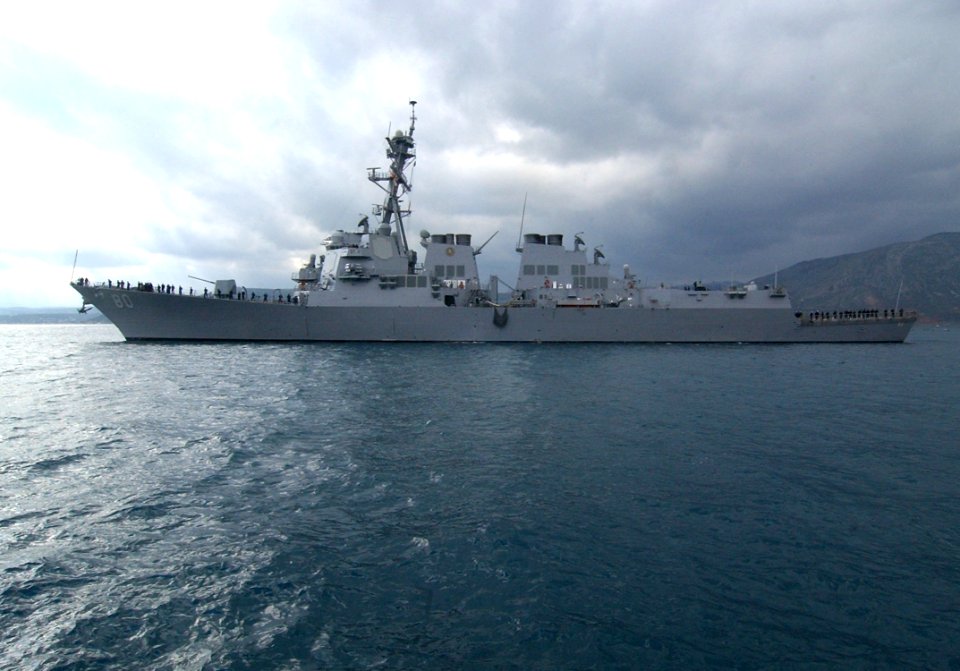 US Navy 060208-N-0780F-004 Sailors assigned to the guided missile destroyer USS Roosevelt (DDG 80) man the rails as the ship arrives in Souda Bay for a routine port visit