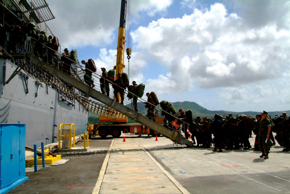 US Navy 060209-N-4772B-118 U.S. Marines assigned to elements of the 31st Marine Expeditionary Unit (31 MEU) board the amphibious dock landing ship USS Harpers Ferry (LSD 49)
