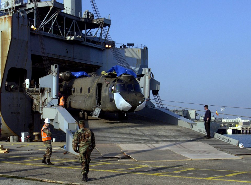 US Navy 060213-F-9105A-077 A U.S. Army CH-47 Chinook helicopter is offloaded from the Military Sealift Command (MSC) roll-on-roll-off ship USNS Pililaau (T-AKR 304)
