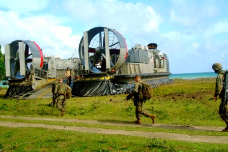 US Navy 060303-N-4772B-165 Marines assigned to the 31st Marine Service Support Group (MSSG) board a Landing Craft, Air Cushion (LCAC) bound for the amphibious dock landing ship USS Harpers Ferry (LSD 49)