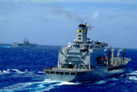 US Navy 060215-N-4772B-105 The amphibious assault ship USS Essex (LHD 2) transit near the Military Sealift Command (MSC) underway replenishment (UNREP) oiler USNS Walter S. Diehl (T-AO 193) prior to an UNREP