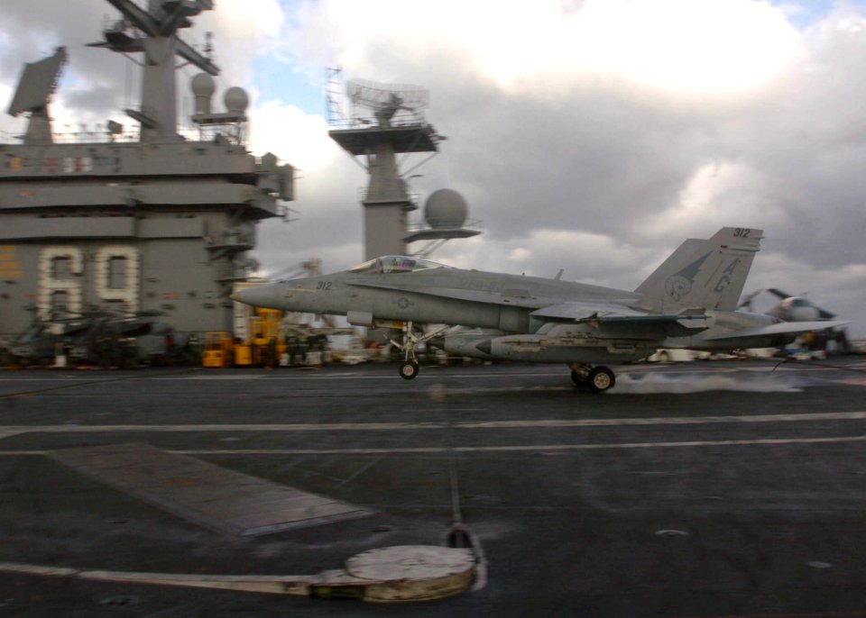 US Navy 060307-N-7359L-006 An F-A-18C Hornet assigned to Strike Fighter Squadron Eight Three (VFA-83) makes an arrested landing aboard the Nimitz-class aircraft carrier USS Dwight D. Eisenhower (CVN 69)
