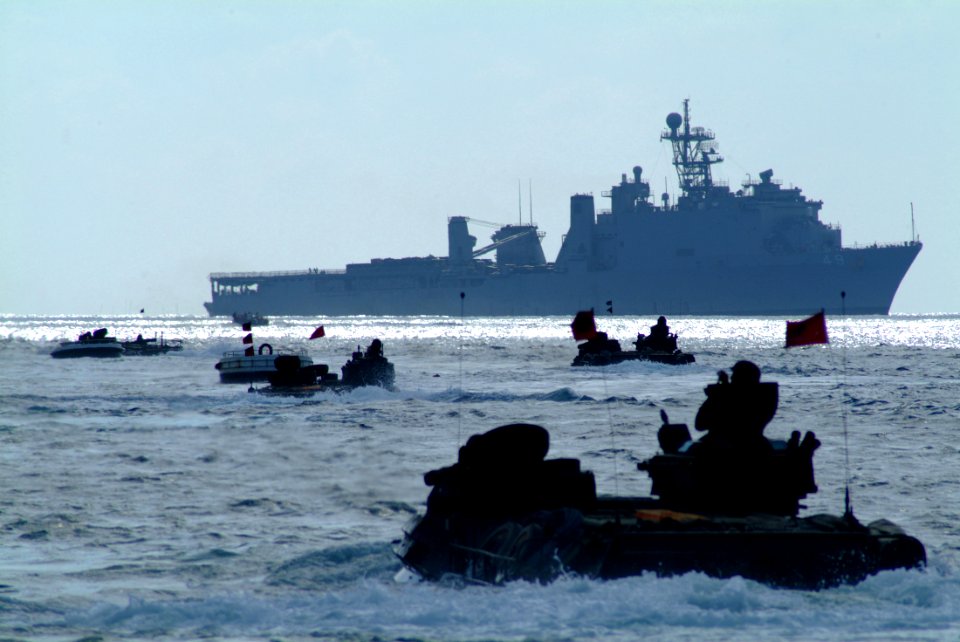 US Navy 060308-N-4772B-354 U.S. Marine Corps armored amphibious vehicles from the 2nd Battalion, 5th Marine Regiment, Battalion Landing Team leave the beach of Iwo Jima