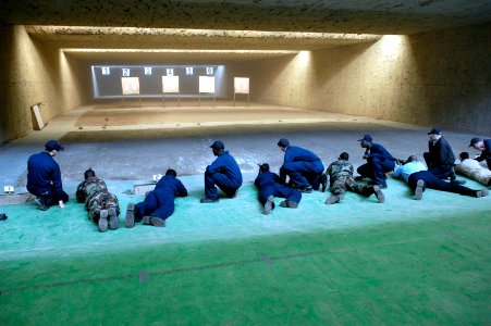 US Navy 060330-N-5592W-026 Sailors assigned to the USS Kitty Hawk (CV 63) participate in M-16A1 weapon qualifications at the Takeyama gun range