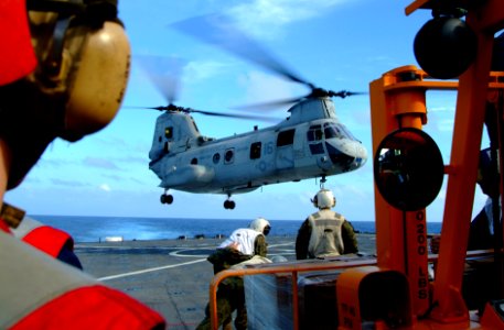 US Navy 060219-N-4772B-004 A CH-46E Sea Knight assigned to the Flying Tigers of Marine Medium Helicopter Squadron 262 (HMM-262), lands aboard the dock landing ship USS Harpers Ferry (LSD 49) to pick up a variety of relief suppl