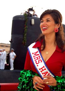 US Navy 060317-N-0879R-005 Mrs. Hawaii 2002, Helen Berger reacts to the friends and family members calling out to their loved ones aboard the Los Angeles-class submarine USS Columbia (SSN 771) as it returned to Pearl Harbor