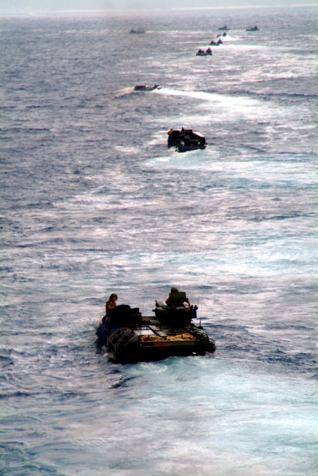 US Navy 060407-N-4772B-028 Amphibious Assault Vehicles (AAV) assigned to the 31st Marine Expeditionary Unit (MEU) make their way out of the well deck