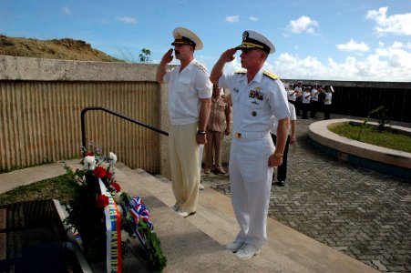 US Navy 060328-N-1906L-012 Chief of Staff and first Deputy Commander of Russian Federated Navy Pacific Fleet Vice Adm. Konstantin Sidenko, and Commander of U.S. Naval Forces Marianas (NNS) Rear Adm. Joe Leidig salute during a w