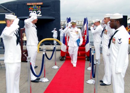 US Navy 060314-N-0879R-001 USS Key West (SSN 722) Sailors salute as sideboys, after Cmdr. Thomas E. Ishee relieves Capt. Kenneth R. Sault as Deputy Commander, Submarine Squadron Seven