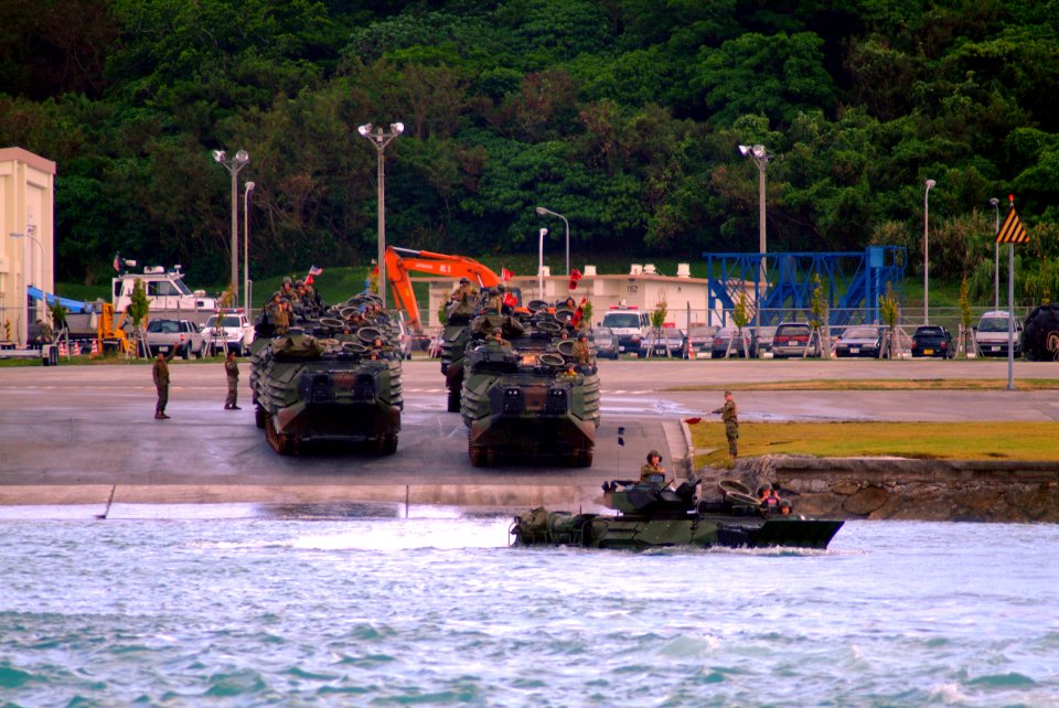 US Navy 060322-N-4772B-027 Amphibious Assault Vehicles (AAV) assigned to the 31st Marine Expeditionary Unit (MEU) depart the beach in Okinawa bound for the amphibious dock landing ship USS Harpers Ferry (LSD 49)