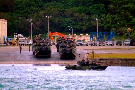 US Navy 060322-N-4772B-027 Amphibious Assault Vehicles (AAV) assigned to the 31st Marine Expeditionary Unit (MEU) depart the beach in Okinawa bound for the amphibious dock landing ship USS Harpers Ferry (LSD 49)