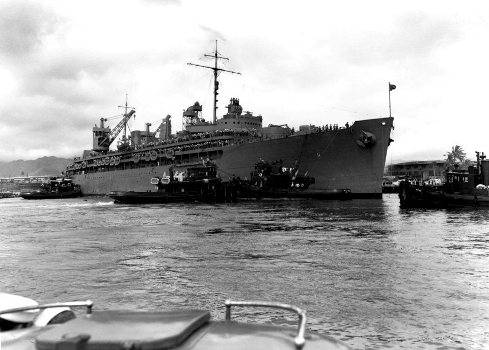 USS Fulton (AS-11) arriving at Pearl Harbor with USS Yorktown (CV-5) survivors 1942