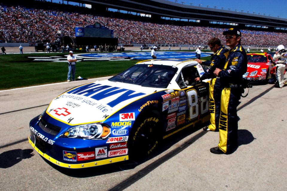 US Navy 060408-F-0558k-035 Mark McFarland, driver of the No. 88 Navy Accelerate Your Life Chevrolet Monte Carlo is strapped in and ready to start his engine