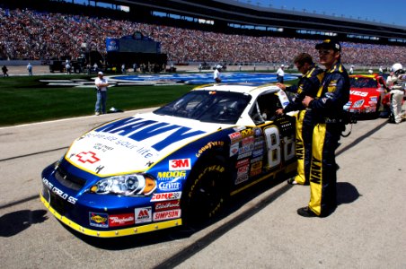 US Navy 060408-F-0558k-035 Mark McFarland, driver of the No. 88 Navy Accelerate Your Life Chevrolet Monte Carlo is strapped in and ready to start his engine photo