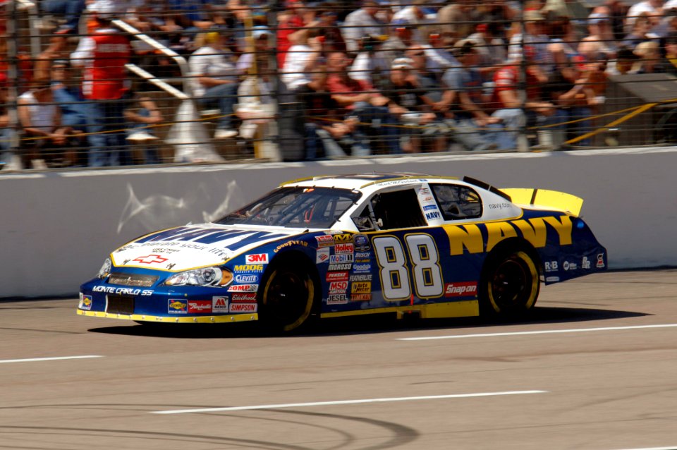 US Navy 060408-F-0558k-041 Mark McFarland, driver of No. 88 Navy Accelerate Your Life Chevrolet Monte Carlo races around the Texas Motor Speedway during the NASCAR Busch Series O'Reilly 300