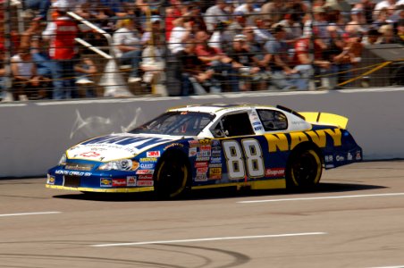 US Navy 060408-F-0558k-041 Mark McFarland, driver of No. 88 Navy Accelerate Your Life Chevrolet Monte Carlo races around the Texas Motor Speedway during the NASCAR Busch Series O'Reilly 300 photo