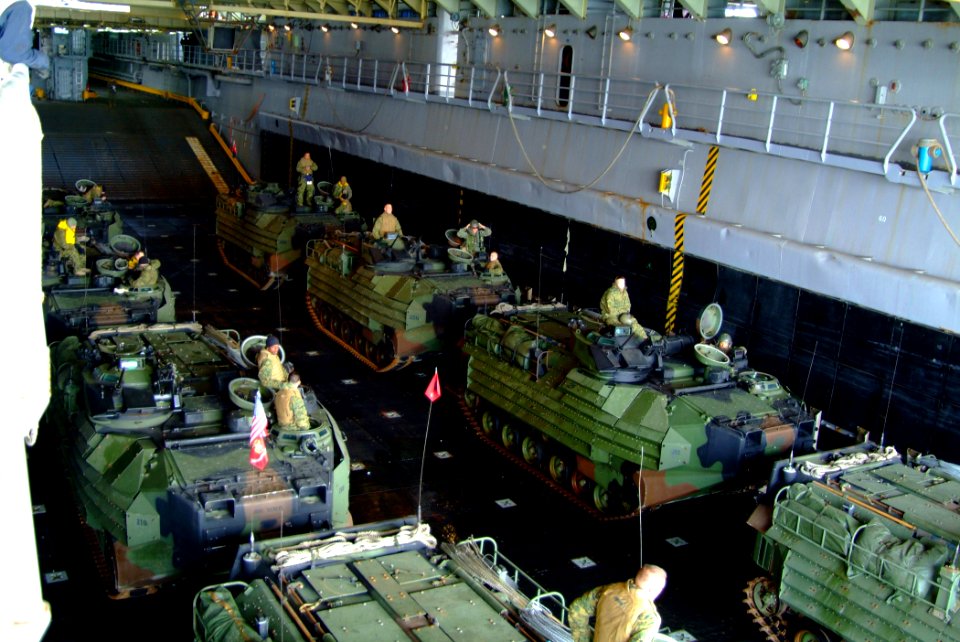US Navy 060329-N-4772B-133 - Marines from the 31st Marine Expeditionary Unit (MEU) stage in their Amphibious Assault Vehicles (AAV) as they prepare to depart the well deck of the amphibious dock landing ship USS Harpers Ferry (
