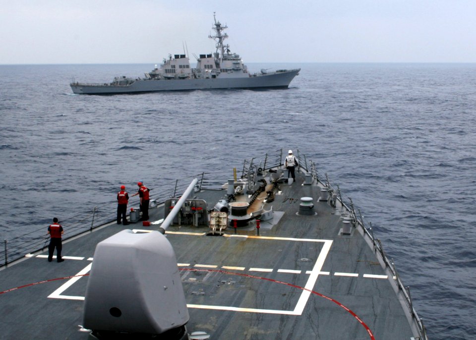 US Navy 060504-N-4953E-005 The guided-missile destroyer USS Curtis Wilbur (DDG 54) tows the guided-missile destroyer USS Stethem (DDG 63) during a towing exercise (TOWEX)