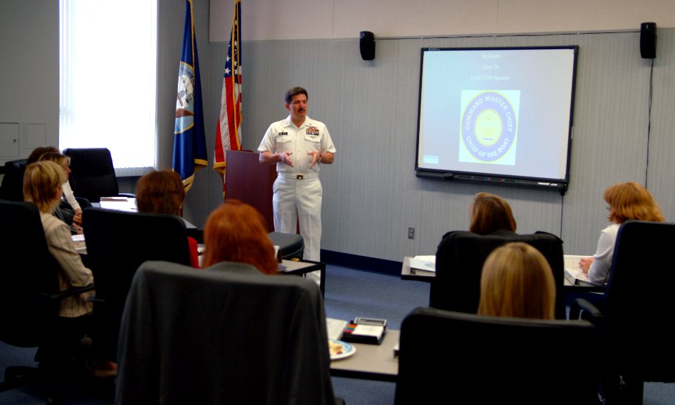 US Navy 060501-N-0962S-005 Master Chief Petty Officer of the Navy (MCPON) Terry Scott offers opening remarks at the commencement of the inaugural Command Master Chief Spouse Leadership Course