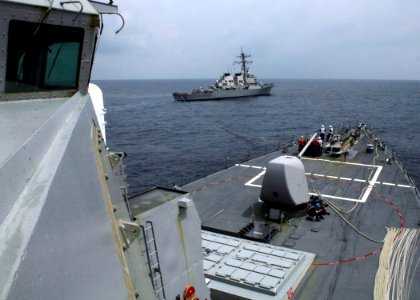 US Navy 060504-N-4953E-023 The guided-missile destroyer USS Curtis Wilbur (DDG 54) tows the guided-missile destroyer USS Stethem (DDG 63) during a towing exercise (TOWEX)