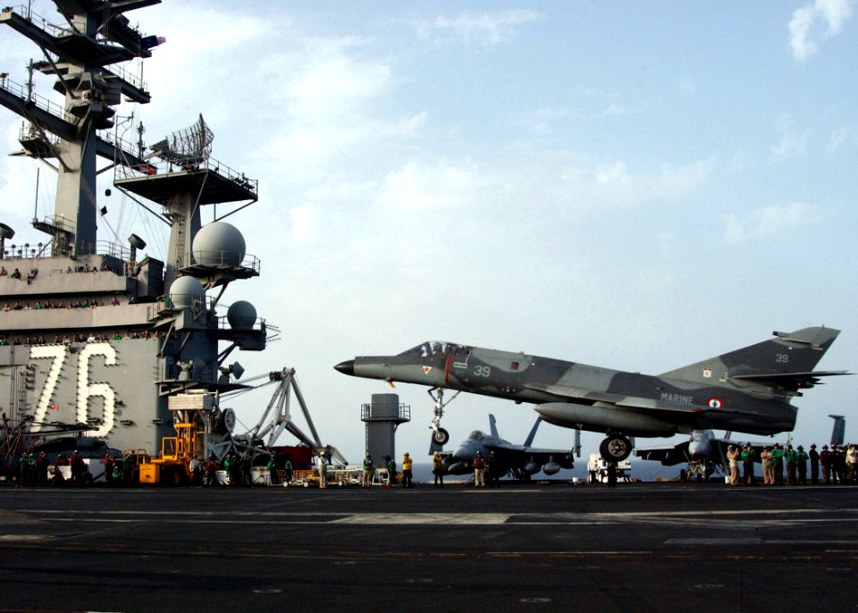 US Navy 060427-N-4776G-204 During a passing exercise with the French nuclear powered surface vessel, FS Charles de Gaulle (R-91), a Super Entendard aircraft performed a touch-and-go on the flight deck of the Nimitz-class aircra