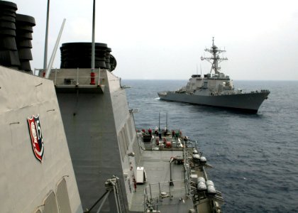 US Navy 060504-N-4953E-007 The guided-missile destroyer USS Stethem (DDG 63) prepares to tow the guided-missile destroyer USS Curtis Wilbur (DDG 54) during a towing exercise (TOWEX)