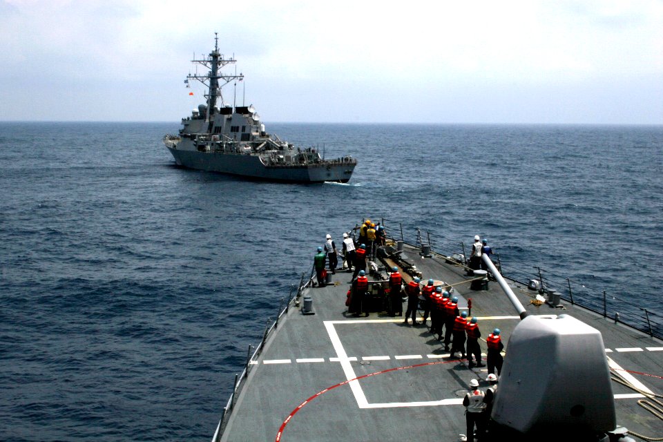 US Navy 060504-N-4953E-027 The guided-missile destroyer USS Curtis Wilbur (DDG 54) tows the guided-missile destroyer USS Stethem (DDG 63) during a towing exercise (TOWEX)