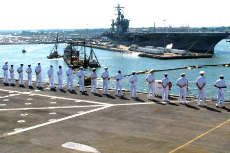 US Navy 060510-N-0780W-001 Sailors man the rails as the Military Sealift Command (MSC) hospital ship USNS Comfort (T-AH 20) arrives at Naval Station Norfolk for the last phase of her training mission