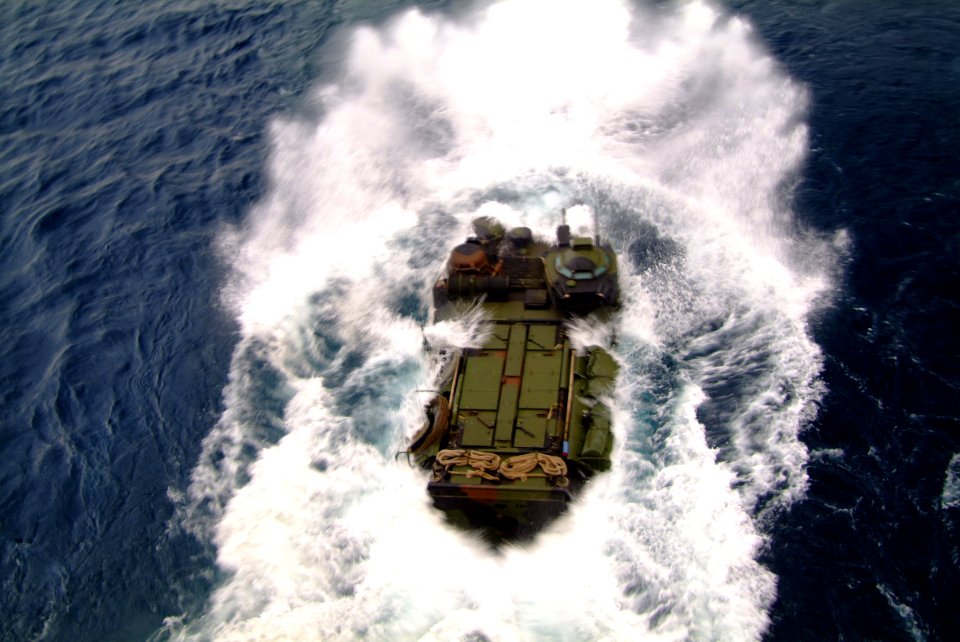 US Navy 060407-N-4772B-029 An Amphibious Assault Vehicle (AAV) assigned to the 31st Marine Expeditionary Unit (MEU) splashes out of the well deck