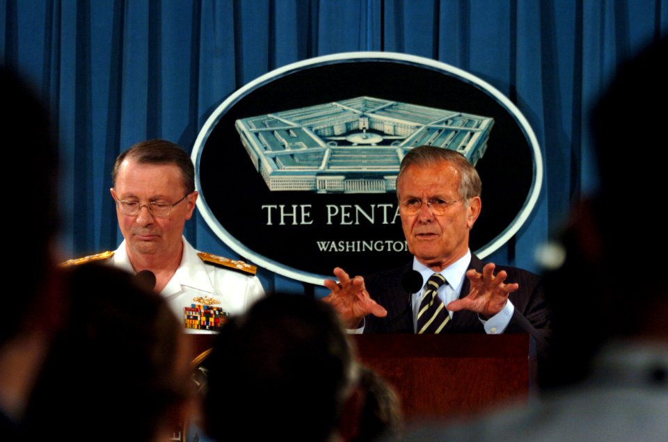 US Navy 060509-F-0193C-004 Secretary of Defense Donald H. Rumsfeld, right, and Vice Chairman of the Joint Chiefs of Staff Adm. Edmund Giambastiani answer questions from members of the media in the Pentagon press room