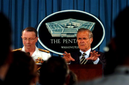 US Navy 060509-F-0193C-004 Secretary of Defense Donald H. Rumsfeld, right, and Vice Chairman of the Joint Chiefs of Staff Adm. Edmund Giambastiani answer questions from members of the media in the Pentagon press room